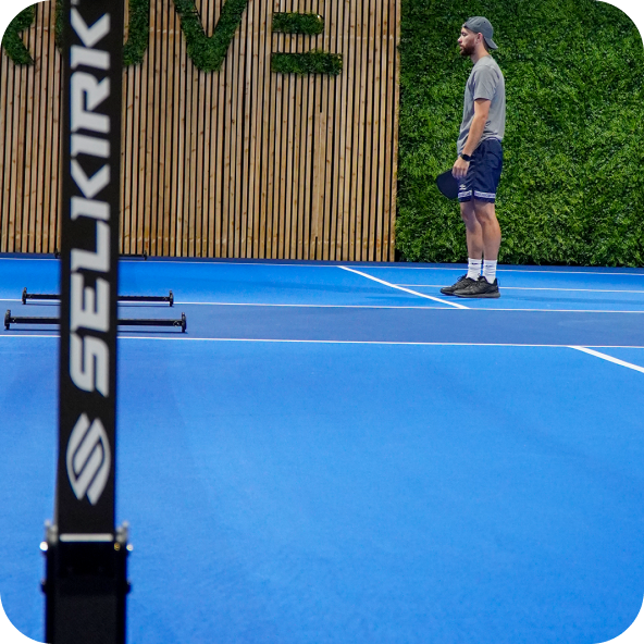 Court view of the grjove pickleball when players are playing